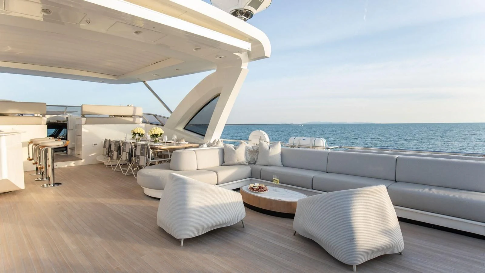 a living room with a large window aboard AZIMUT GRANDE 32M Yacht for Sale