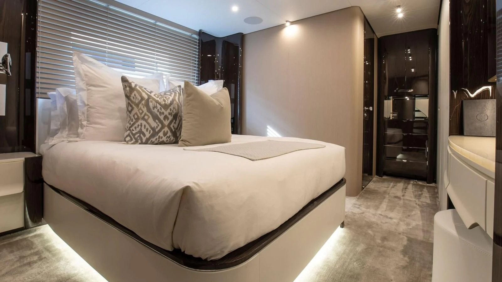 a bed in a room aboard AZIMUT GRANDE 32M Yacht for Sale