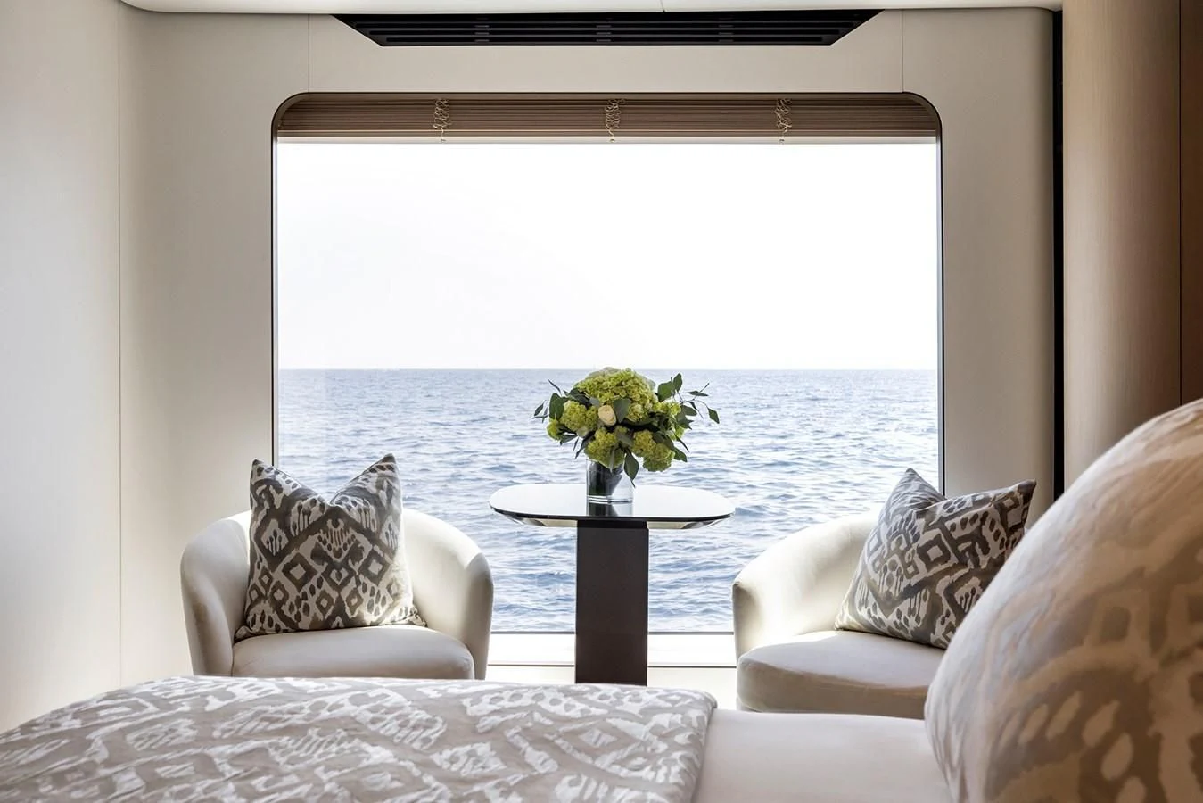 a room with a table and chairs aboard AZIMUT GRANDE 32M Yacht for Sale