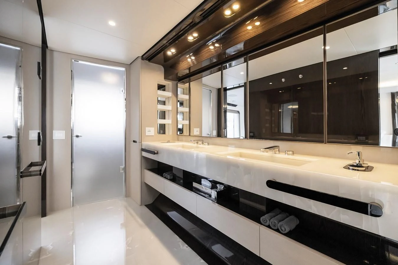 a bathroom with a large mirror aboard AZIMUT GRANDE 32M Yacht for Sale