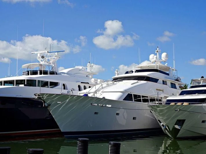 several boats docked at a pier aboard COSTA BRAVA III Yacht for Sale