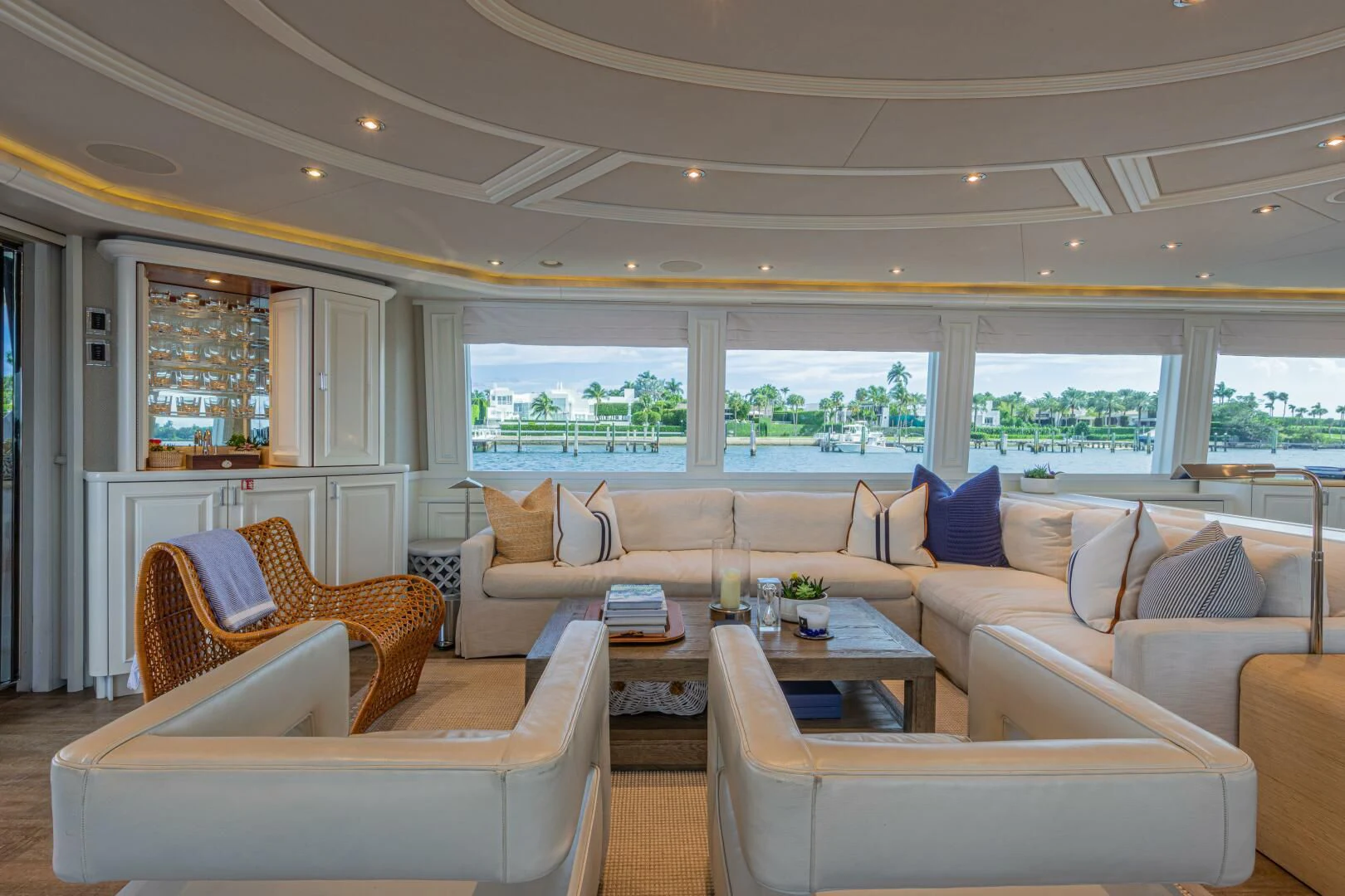 a living room with a large window aboard LIBERTAS Yacht for Sale