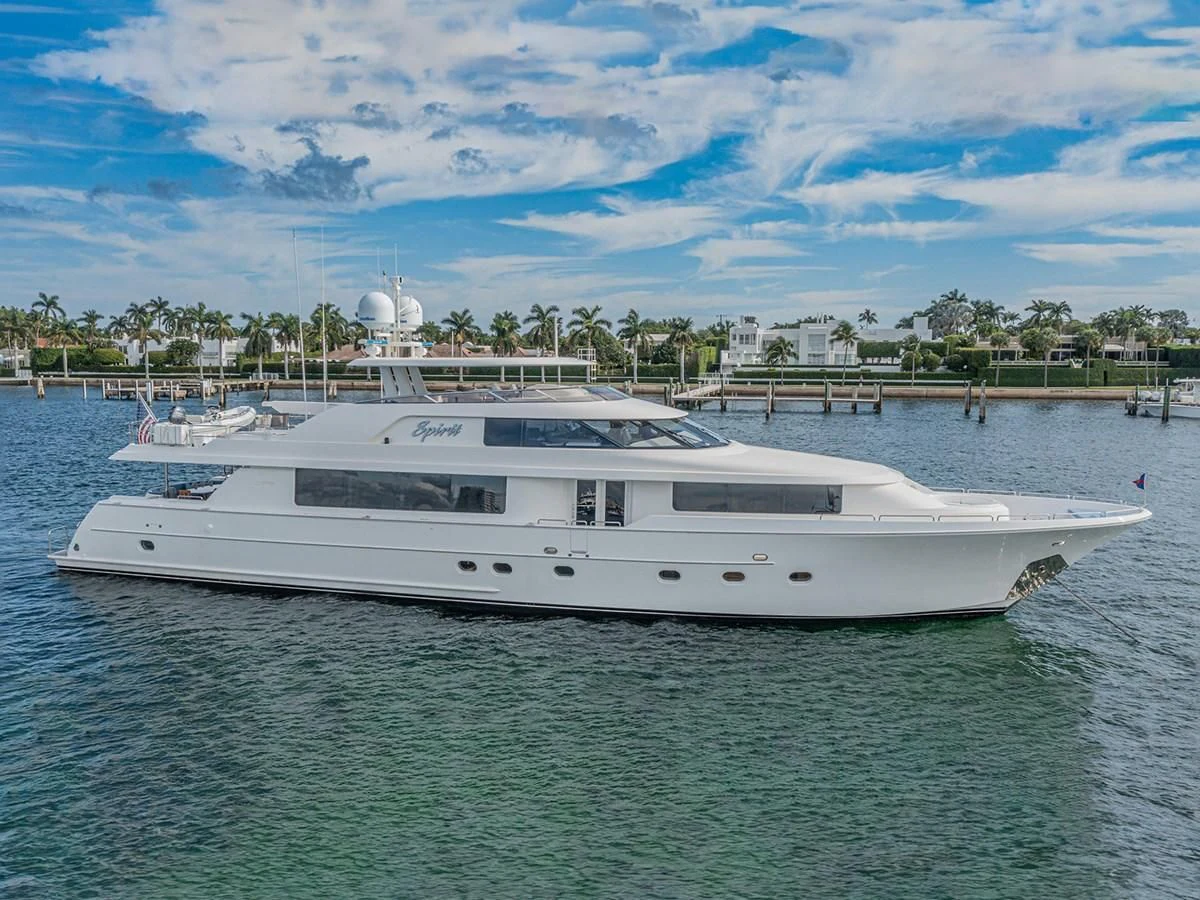 a white boat in the water aboard LIBERTAS Yacht for Sale