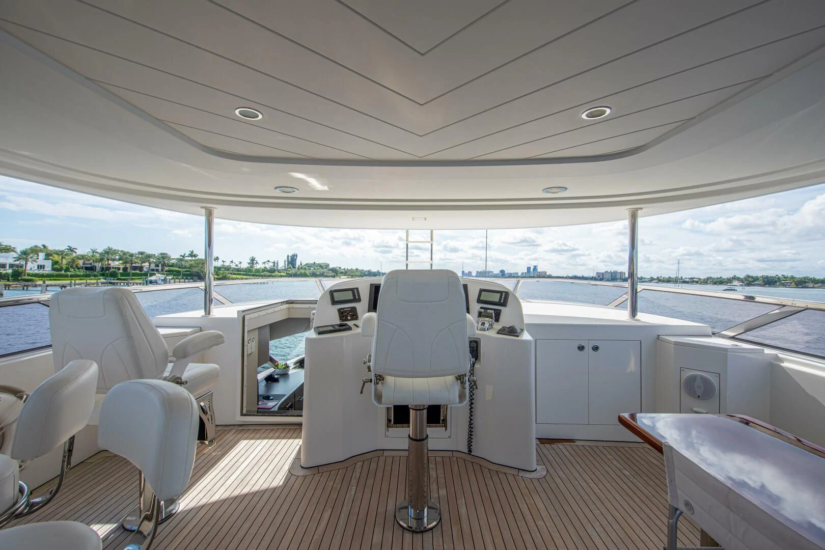 a boat with chairs and tables aboard LIBERTAS Yacht for Sale