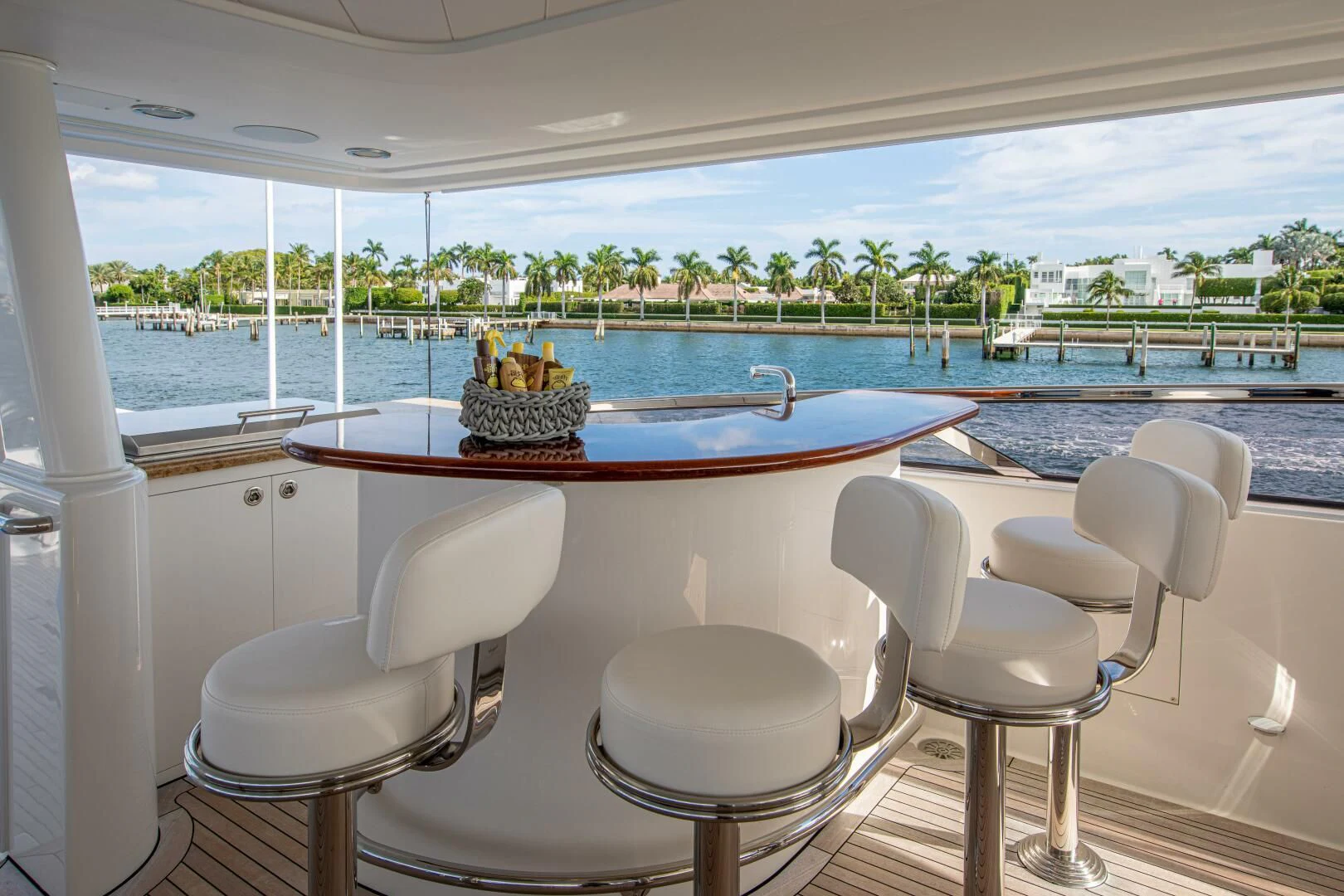 a table with chairs around it aboard LIBERTAS Yacht for Sale