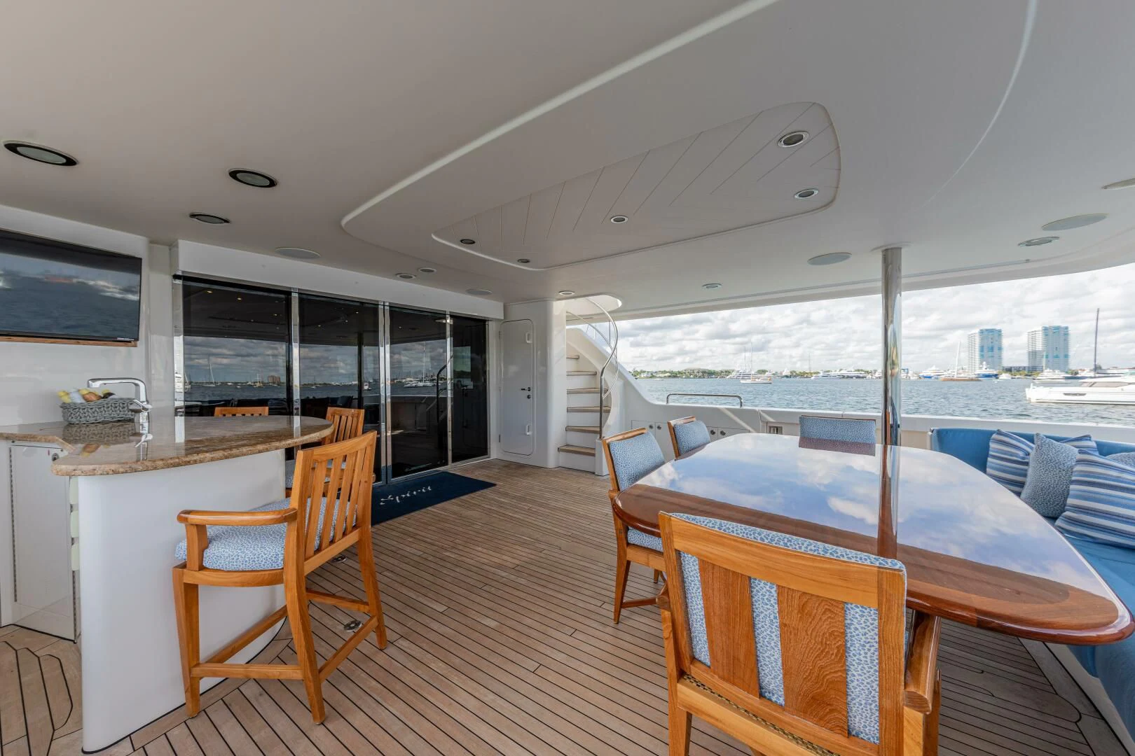 a room with a table and chairs aboard LIBERTAS Yacht for Sale