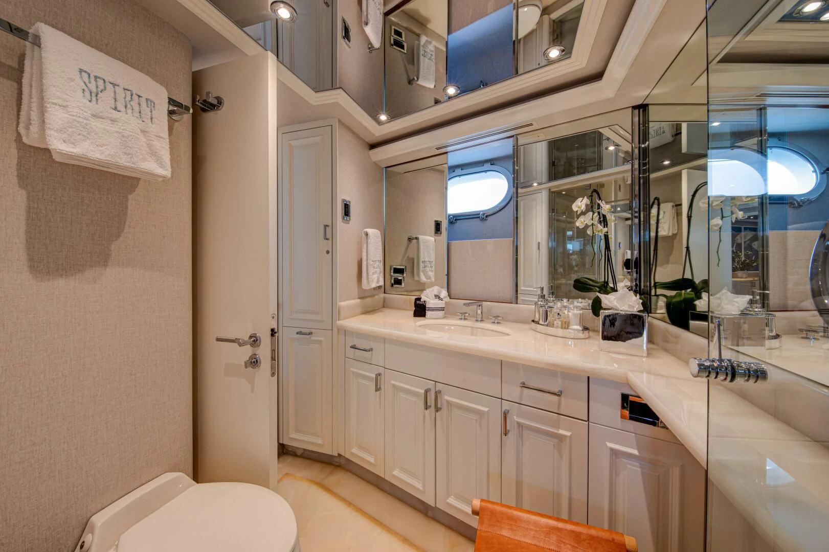 a bathroom with a sink and a mirror aboard LIBERTAS Yacht for Sale