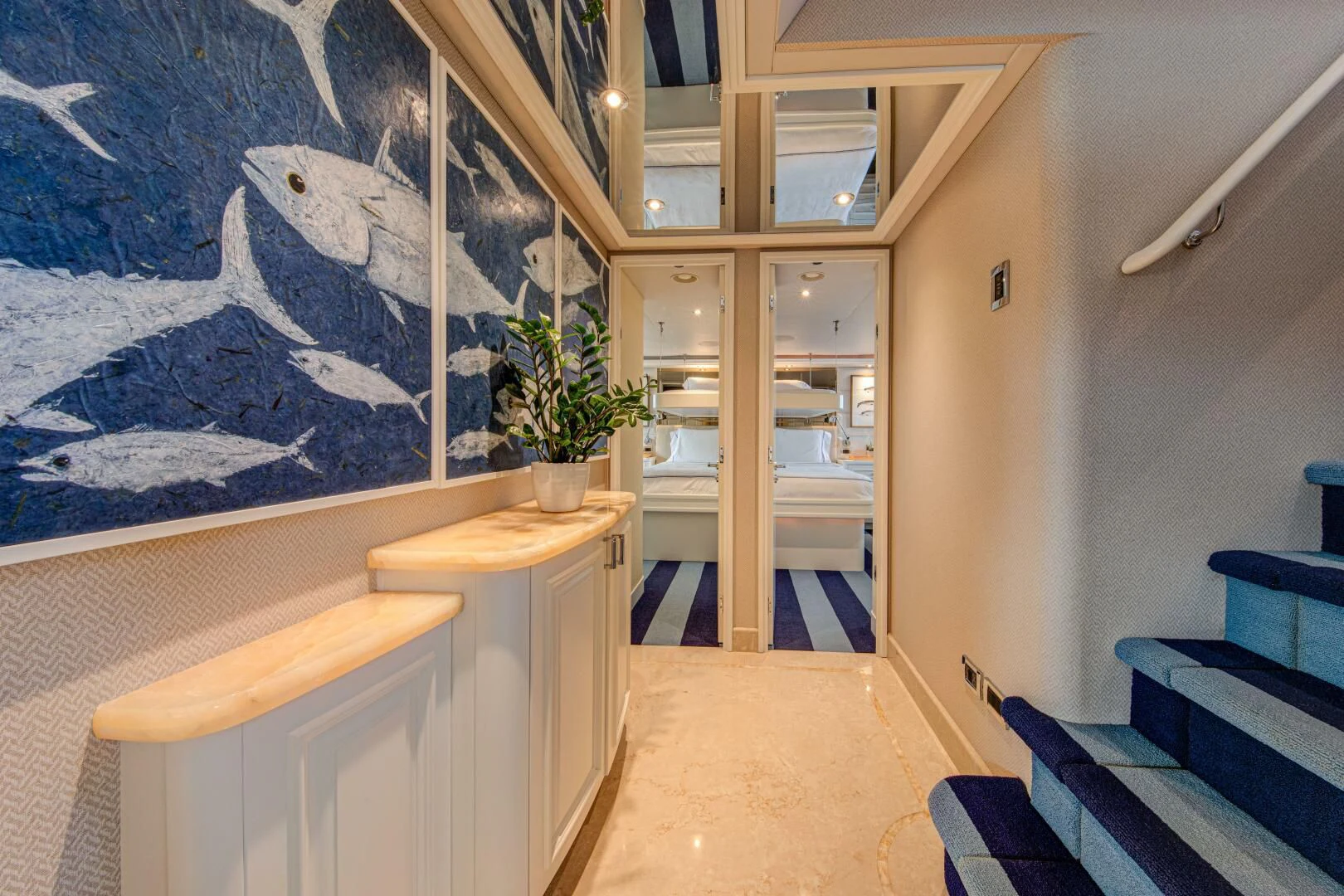 a room with a table and chairs aboard LIBERTAS Yacht for Sale