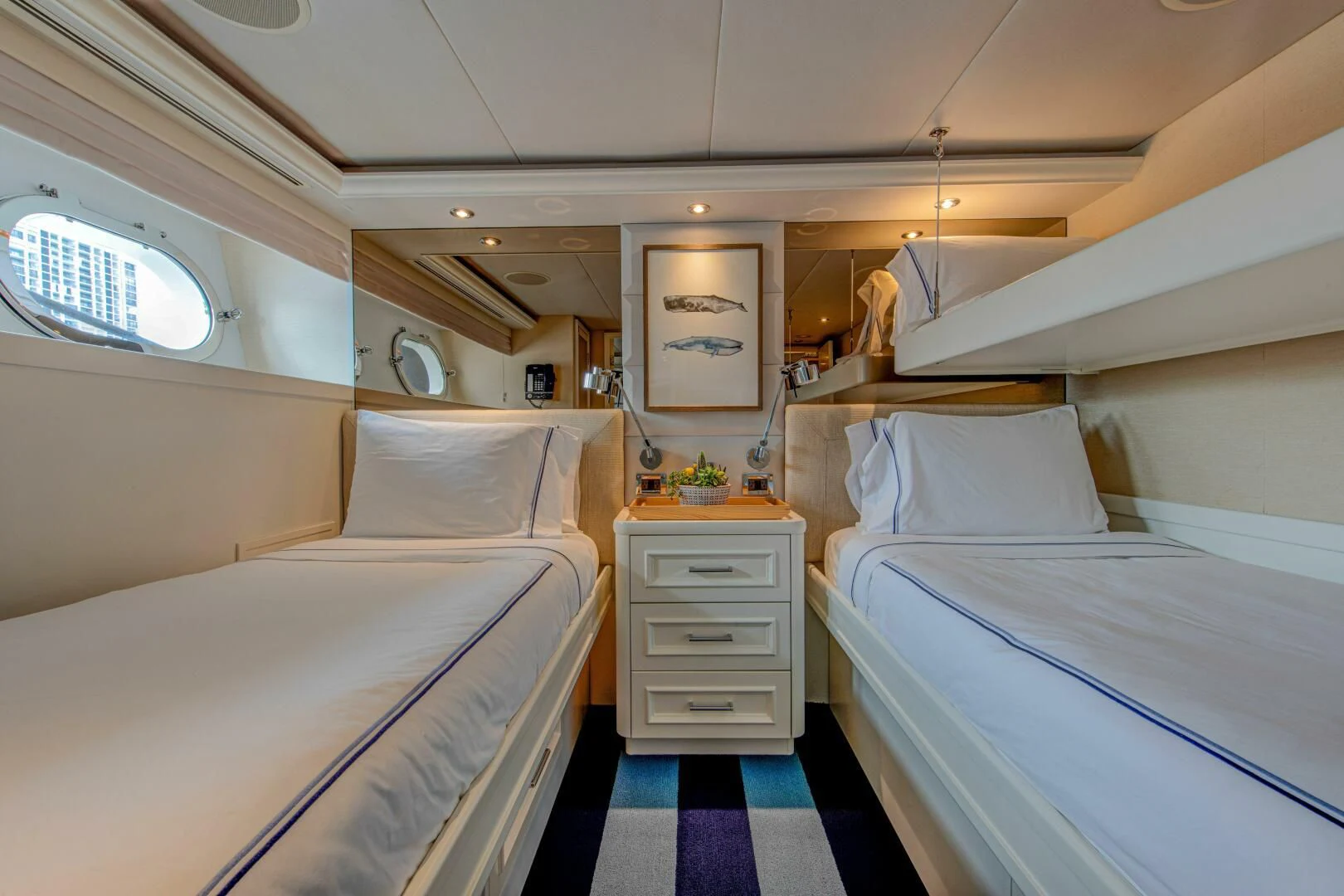 a room with two beds aboard LIBERTAS Yacht for Sale
