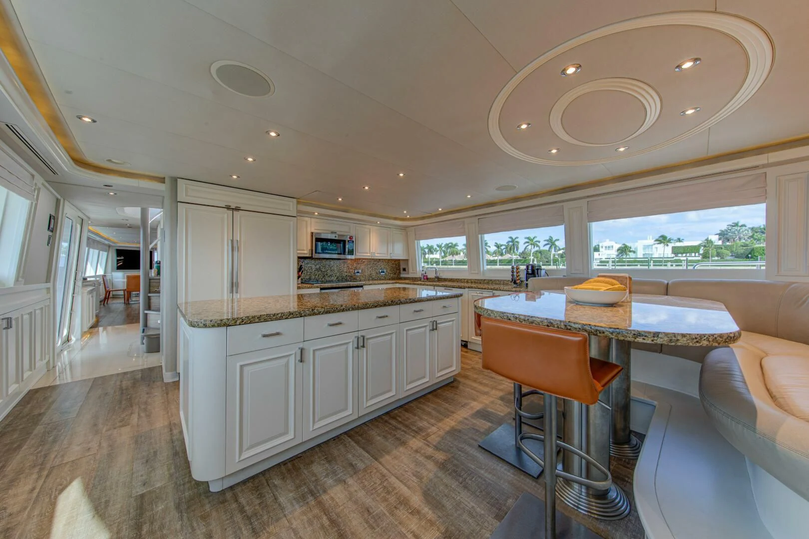 a kitchen and dining area aboard LIBERTAS Yacht for Sale