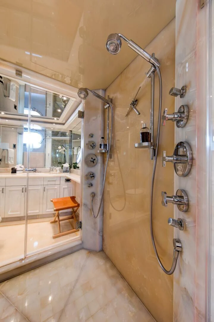a shower unit in a bathroom aboard LIBERTAS Yacht for Sale