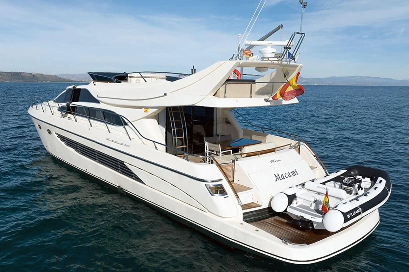 a white yacht on the water aboard MACAMI Yacht for Sale