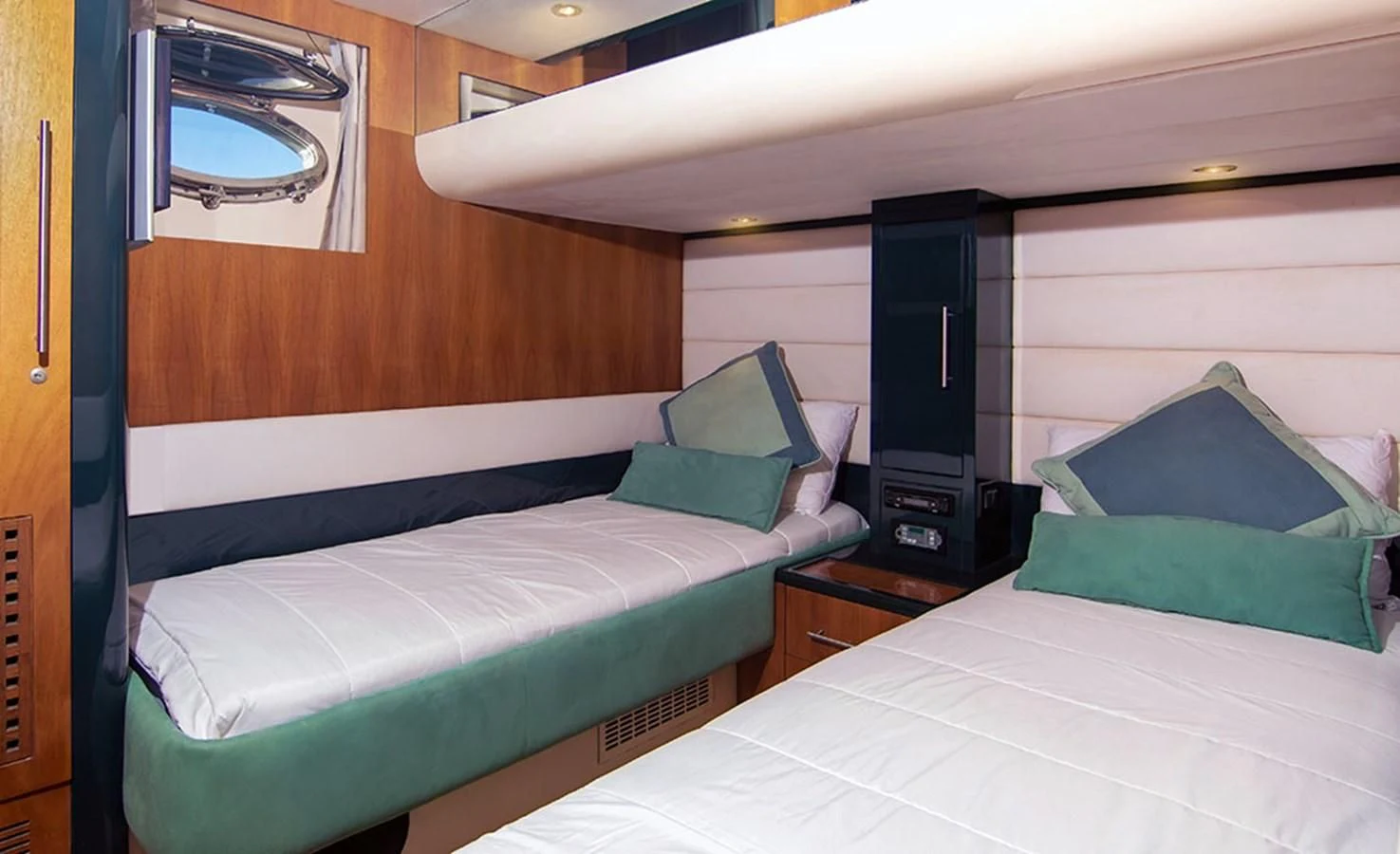 a couple of beds in a room aboard MACAMI Yacht for Sale