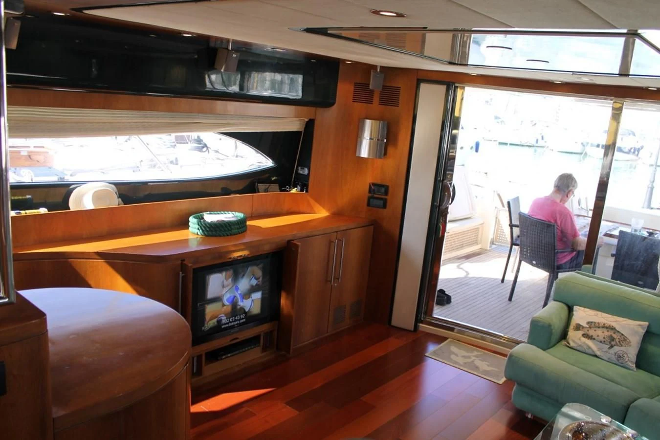 a person sitting at a bar aboard MACAMI Yacht for Sale