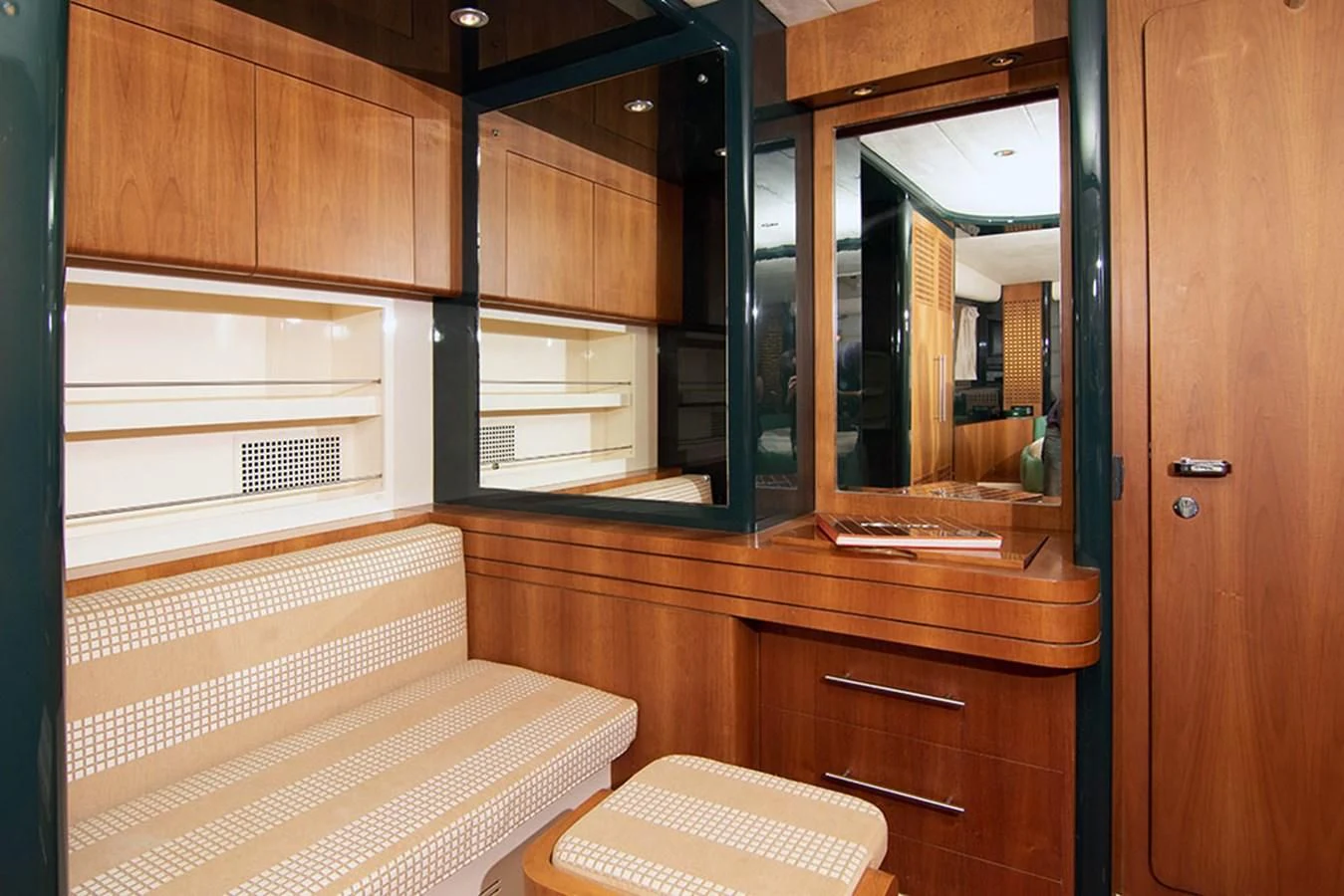 a room with wooden cabinets aboard MACAMI Yacht for Sale