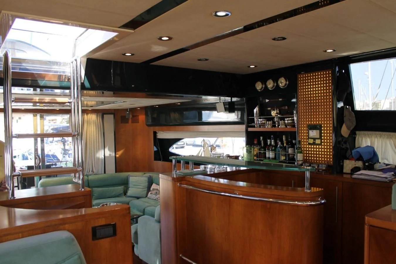 a room with a bar and a couch aboard MACAMI Yacht for Sale