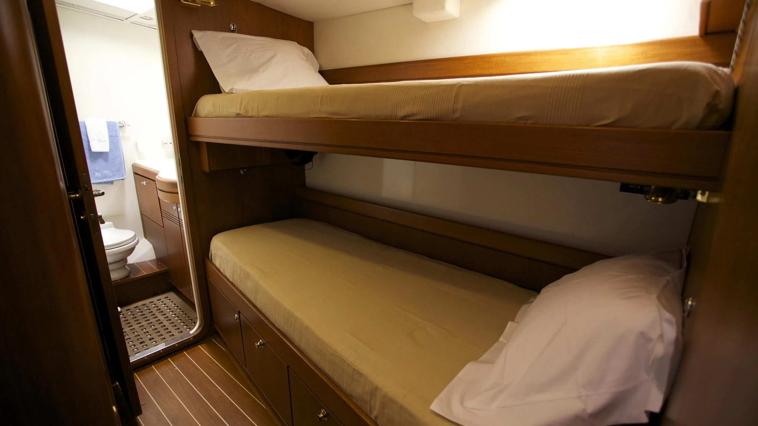 a room with bunk beds aboard EL BAILE Yacht for Sale