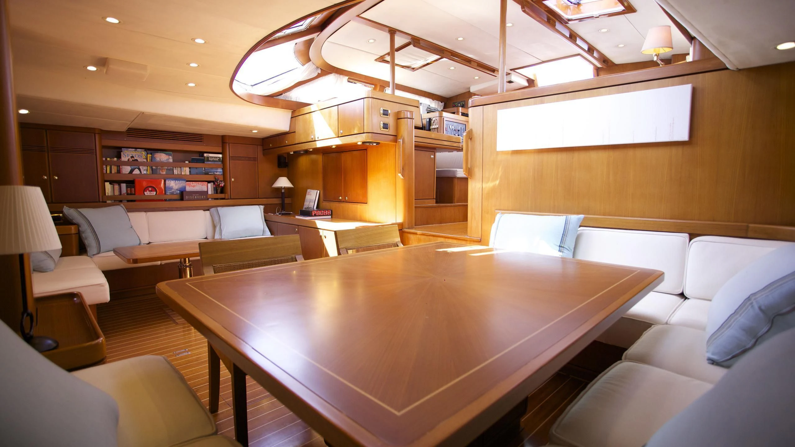 a room with couches and a table aboard EL BAILE Yacht for Sale