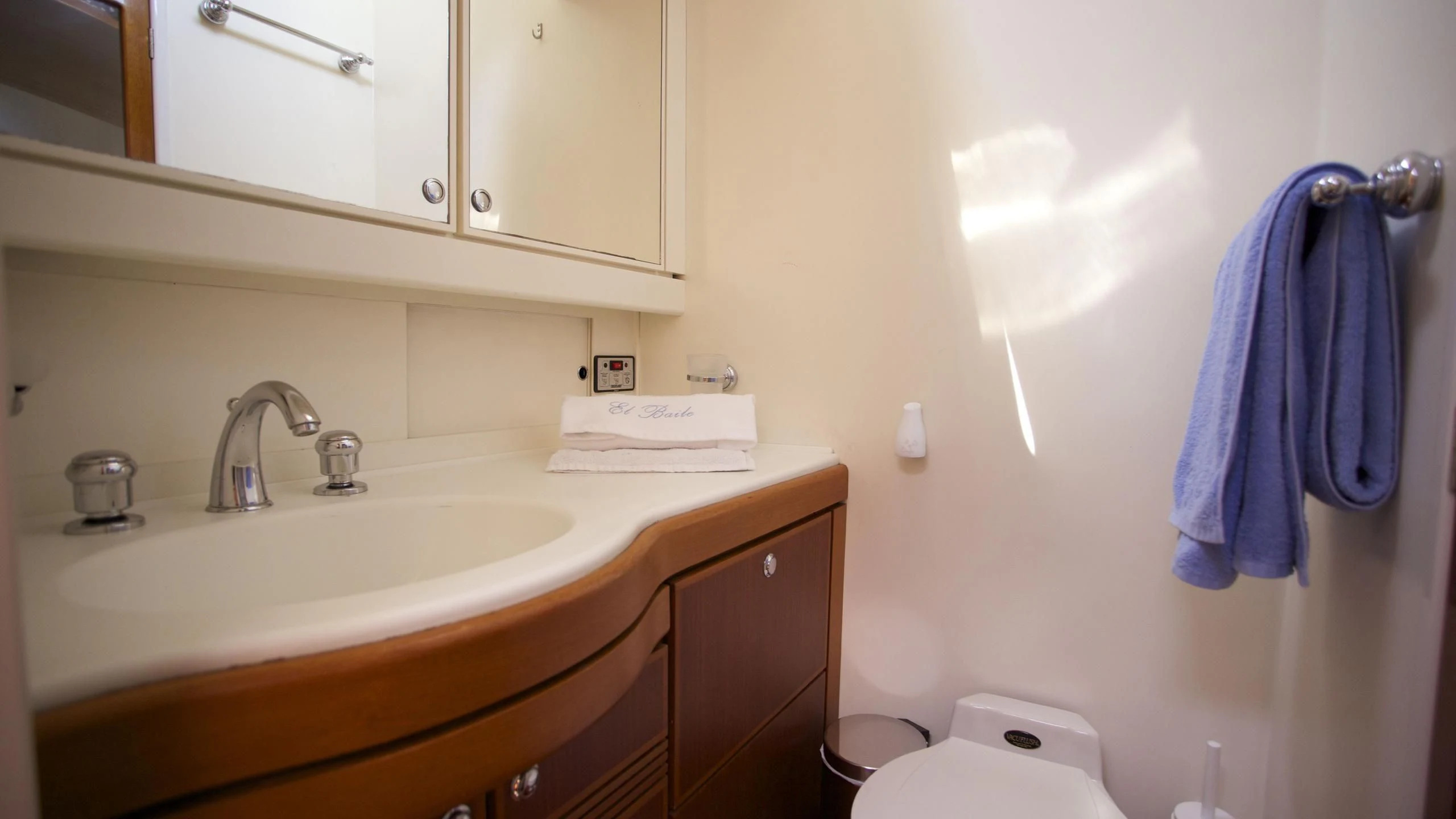 a bathroom with a sink and a toilet aboard EL BAILE Yacht for Sale