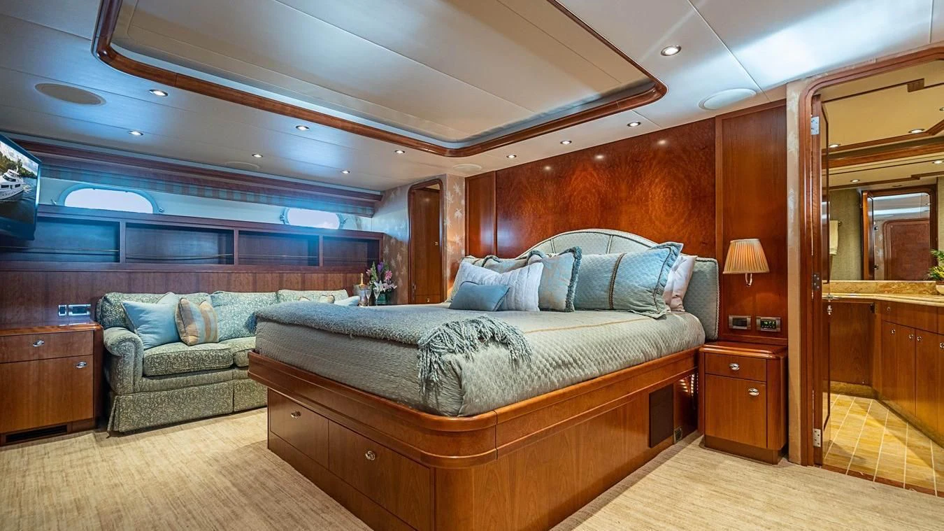 a bed in a room aboard KEMOSABE Yacht for Charter