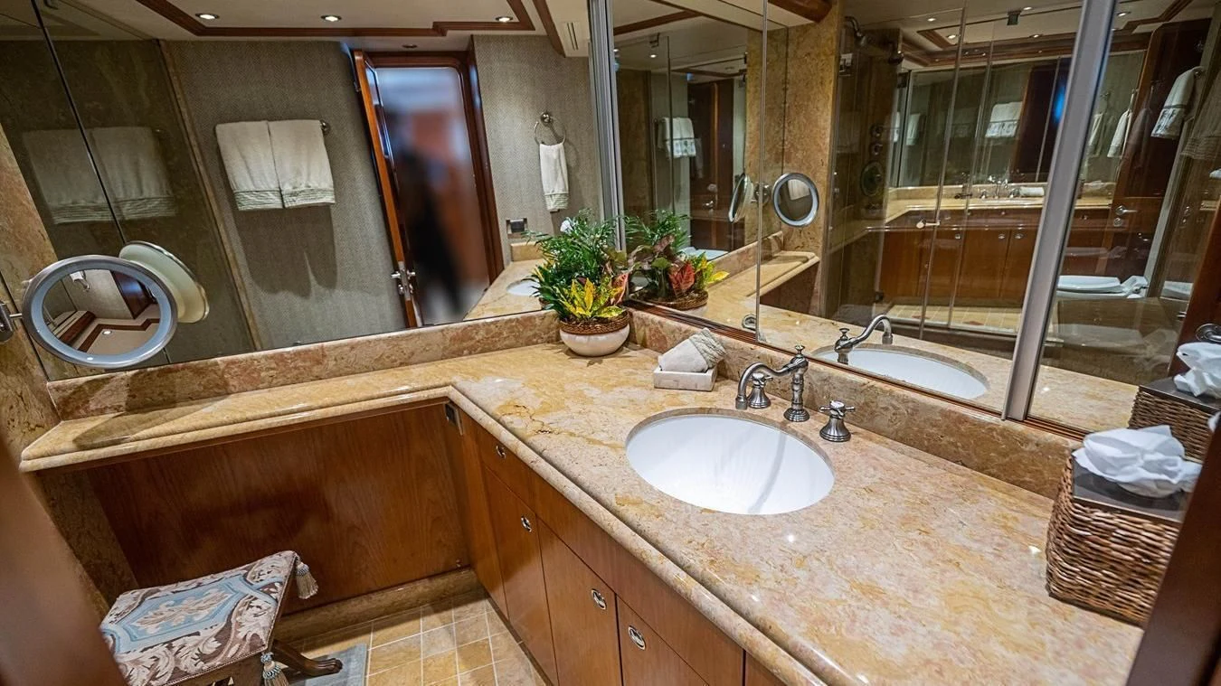 a bathroom with a large countertop aboard KEMOSABE Yacht for Charter