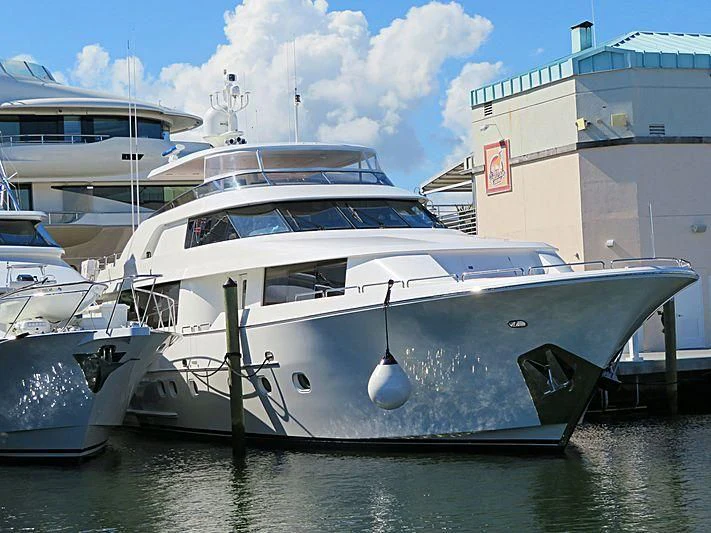 a boat docked at a pier aboard KEMOSABE Yacht for Charter