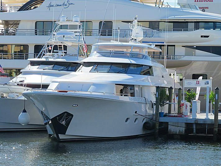 a couple of large white yachts aboard KEMOSABE Yacht for Charter