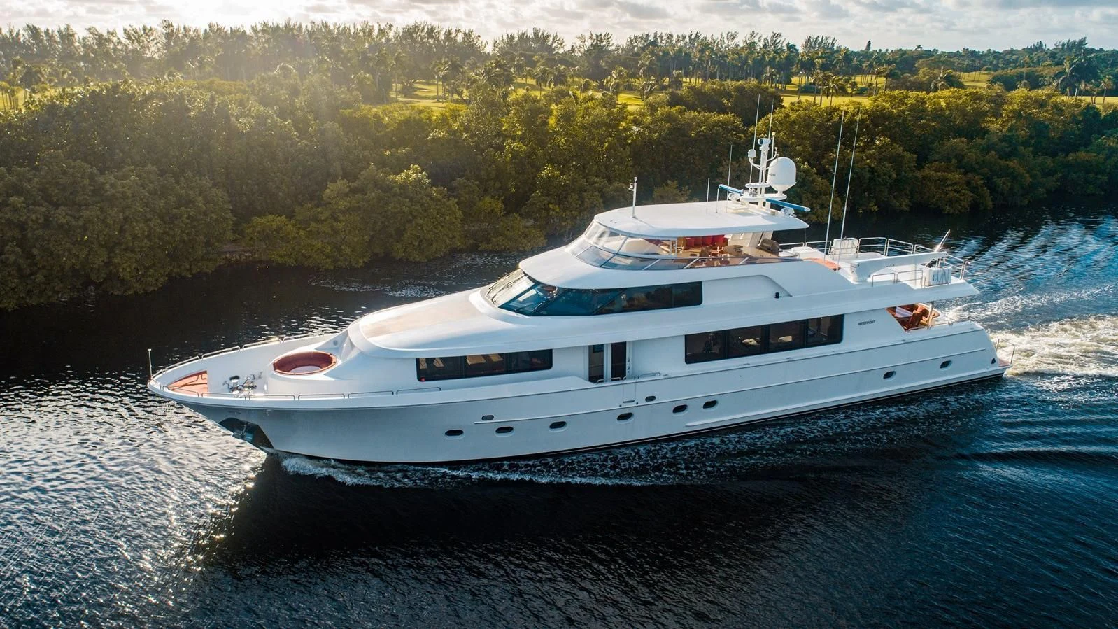 a white yacht on the water aboard KEMOSABE Yacht for Charter