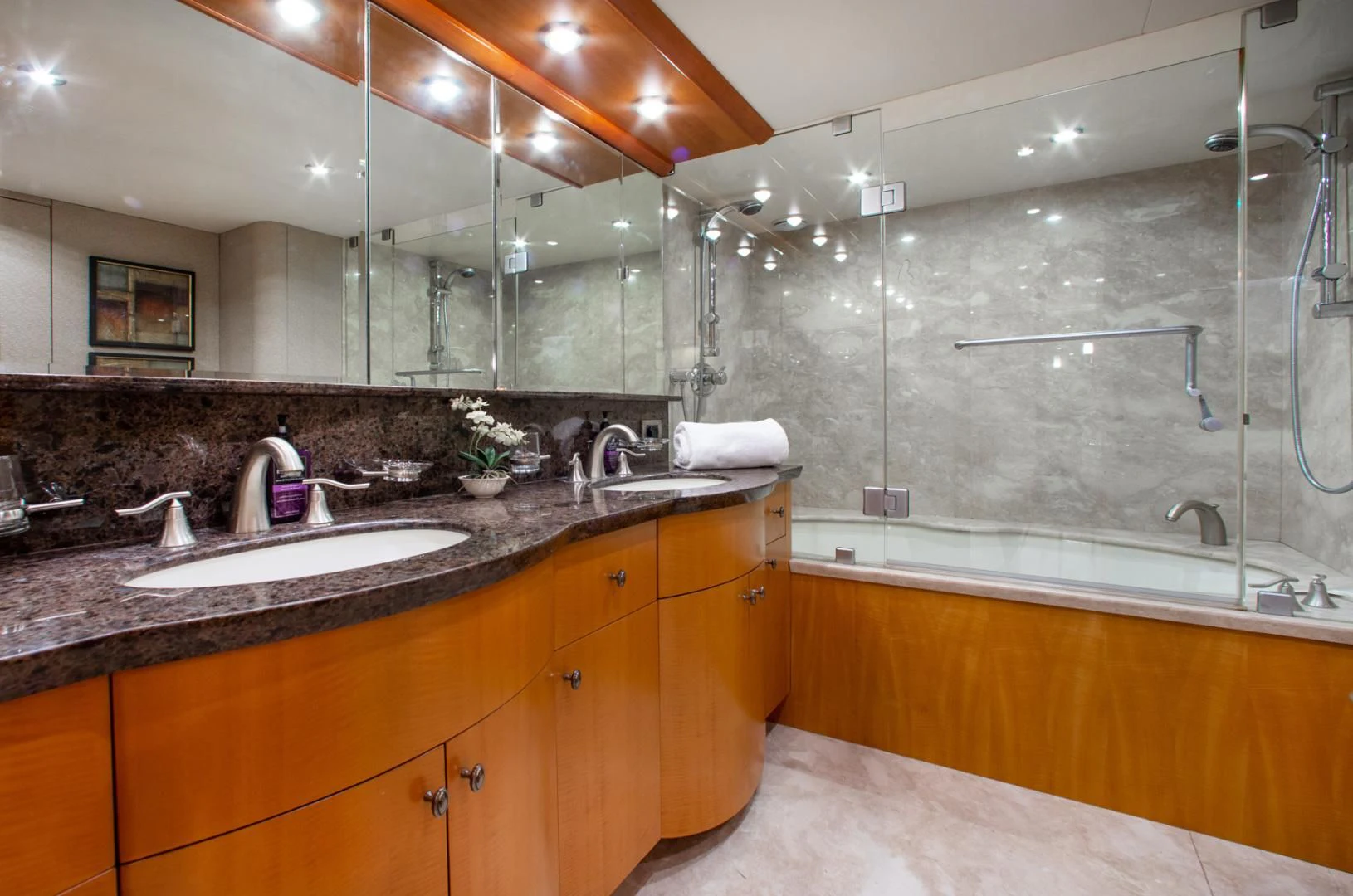 a large bathroom with a large sink aboard 26 NORTH Yacht for Sale