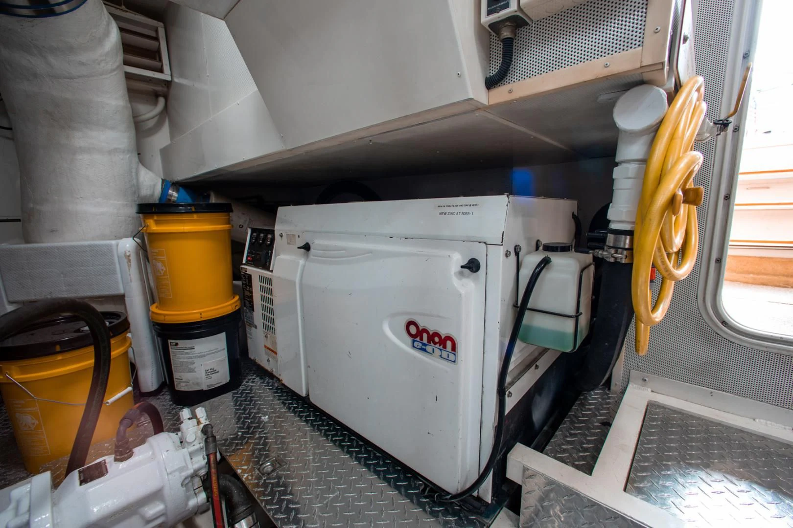 a white machine in a room aboard 26 NORTH Yacht for Sale