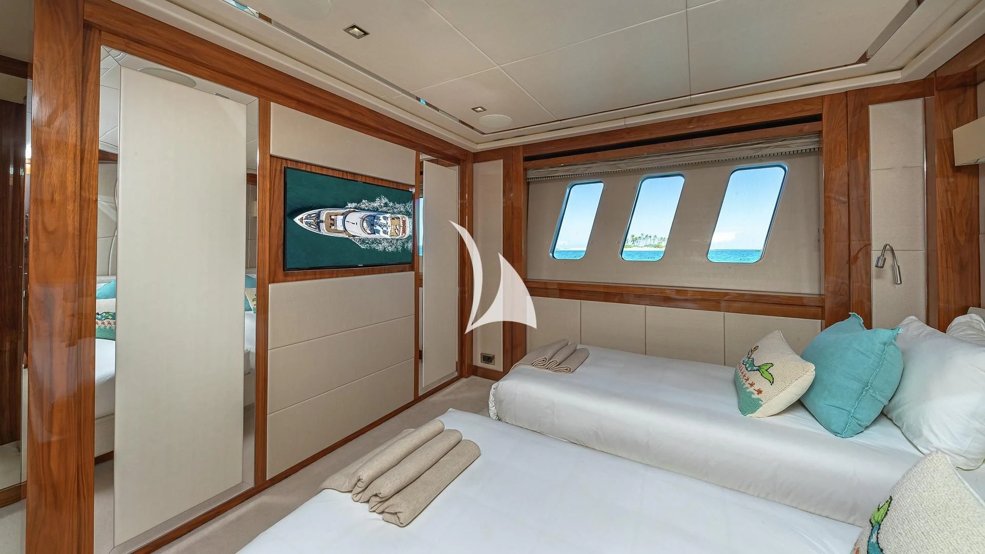a room with a bed and a closet aboard ALESSANDRA III Yacht for Charter