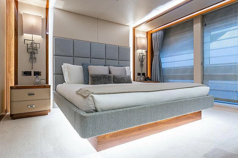 a bed in a room aboard ALESSANDRA III Yacht for Charter