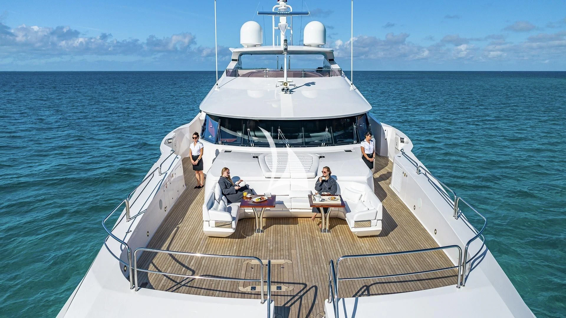 a group of people on a boat aboard ALESSANDRA III Yacht for Charter