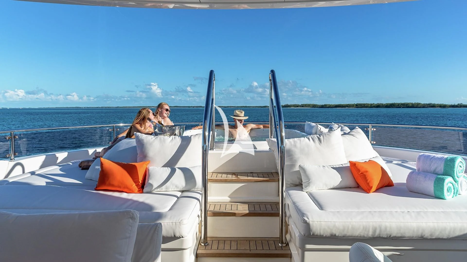 a couple sitting on a boat aboard ALESSANDRA III Yacht for Charter