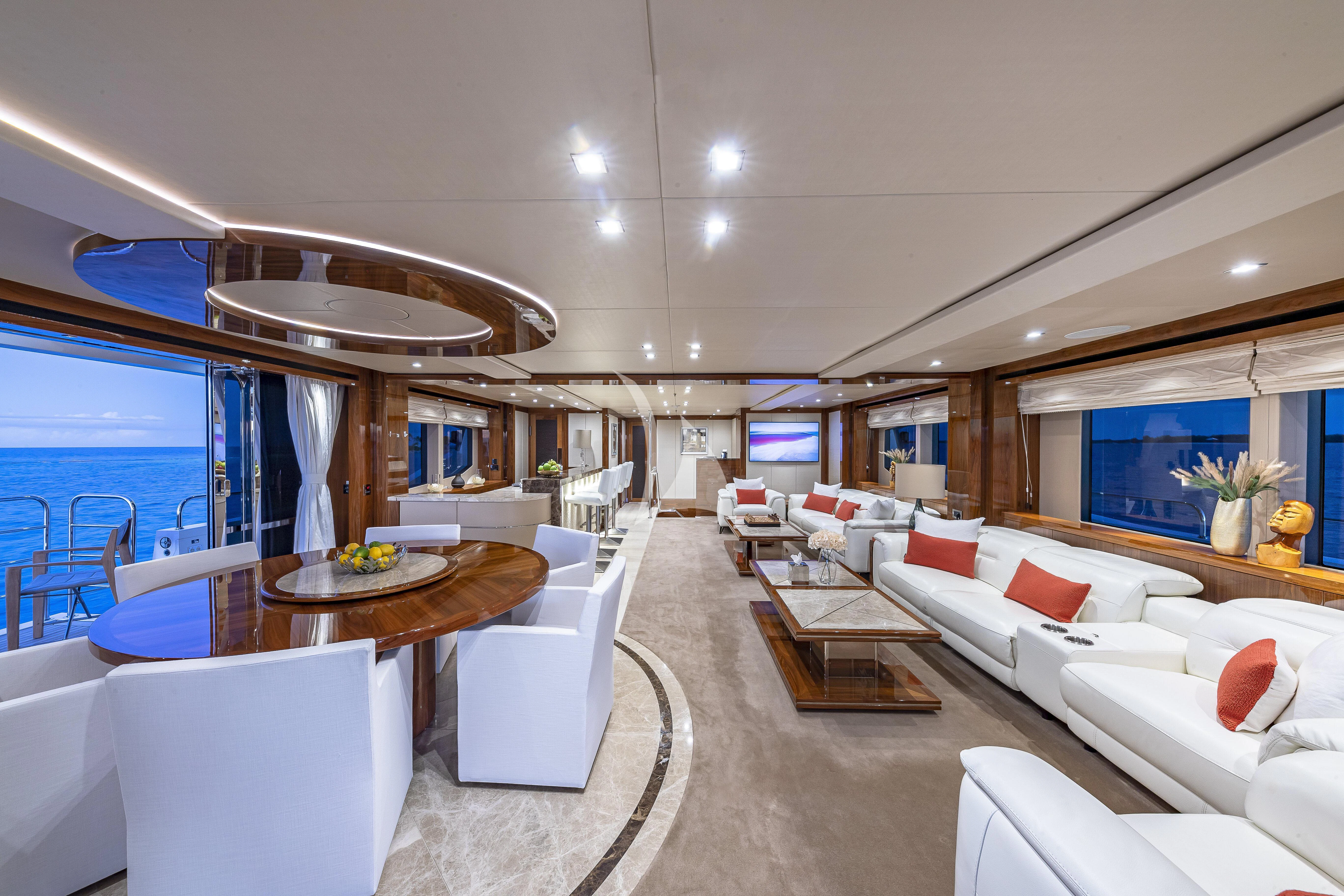 a living room with a large window aboard ALESSANDRA III Yacht for Charter