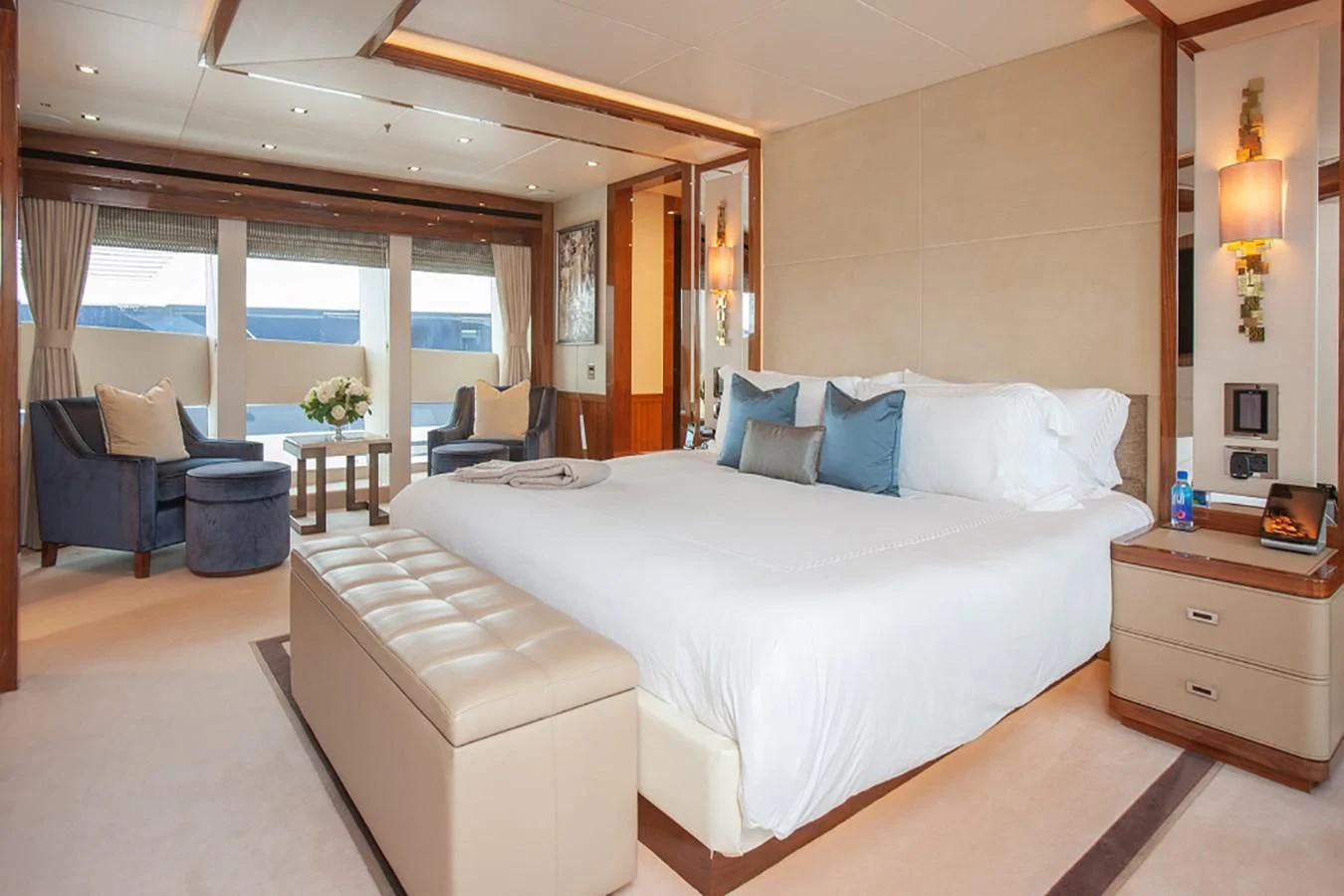 a large bed in a room aboard ALESSANDRA III Yacht for Charter