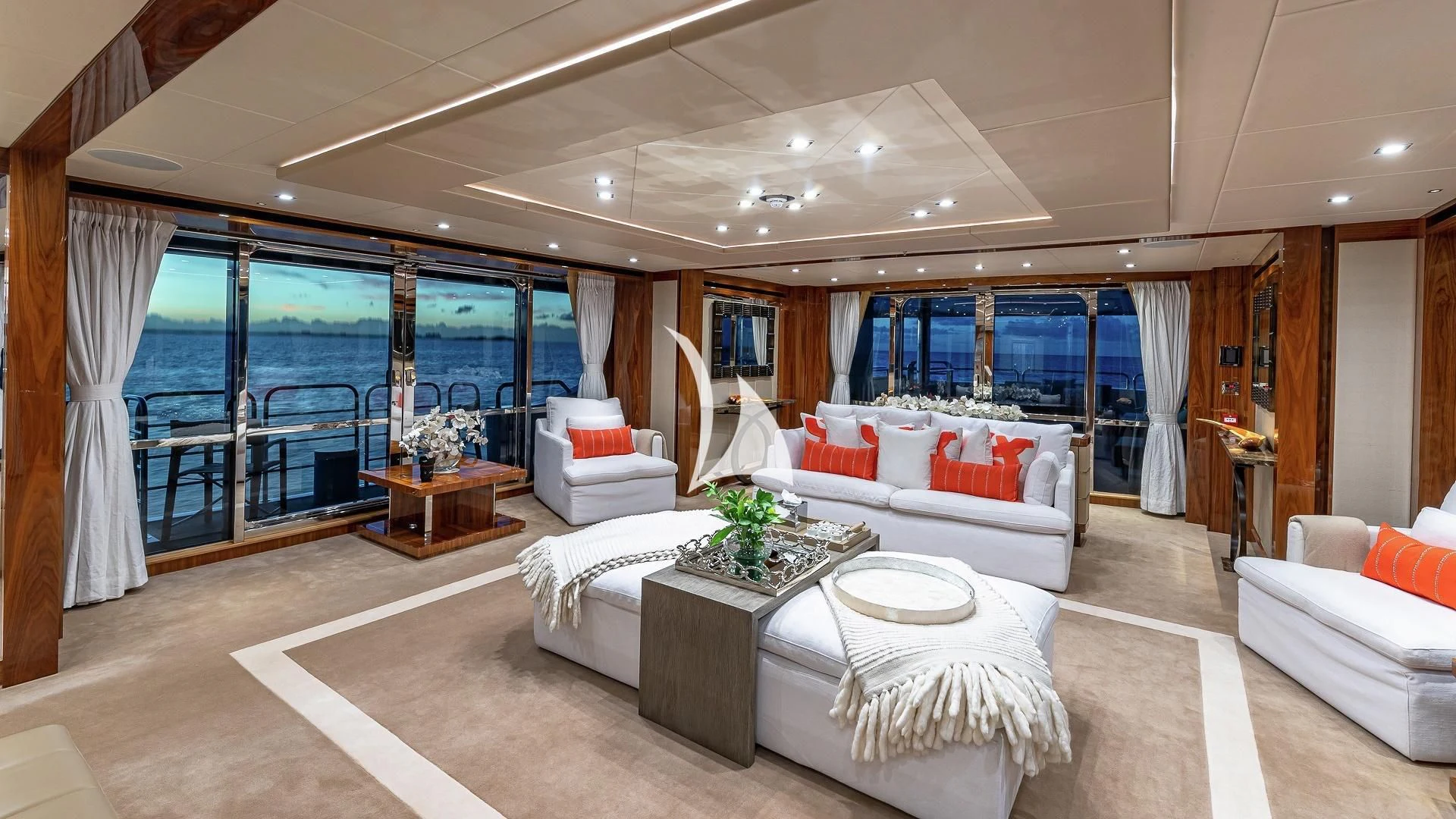 a living room with a large window aboard ALESSANDRA III Yacht for Charter