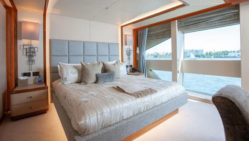 a bed in a room aboard ALESSANDRA III Yacht for Charter