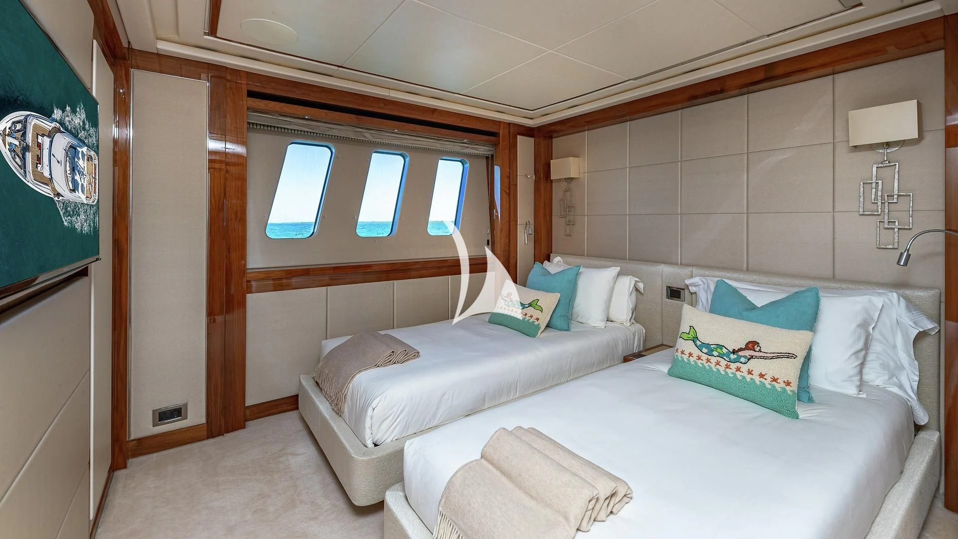 a room with a bed and a window aboard ALESSANDRA III Yacht for Charter