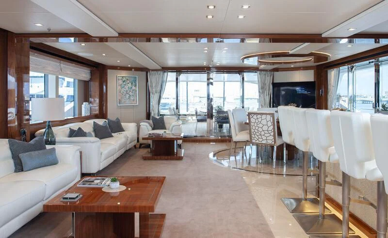 a living room with a large window aboard ALESSANDRA III Yacht for Charter