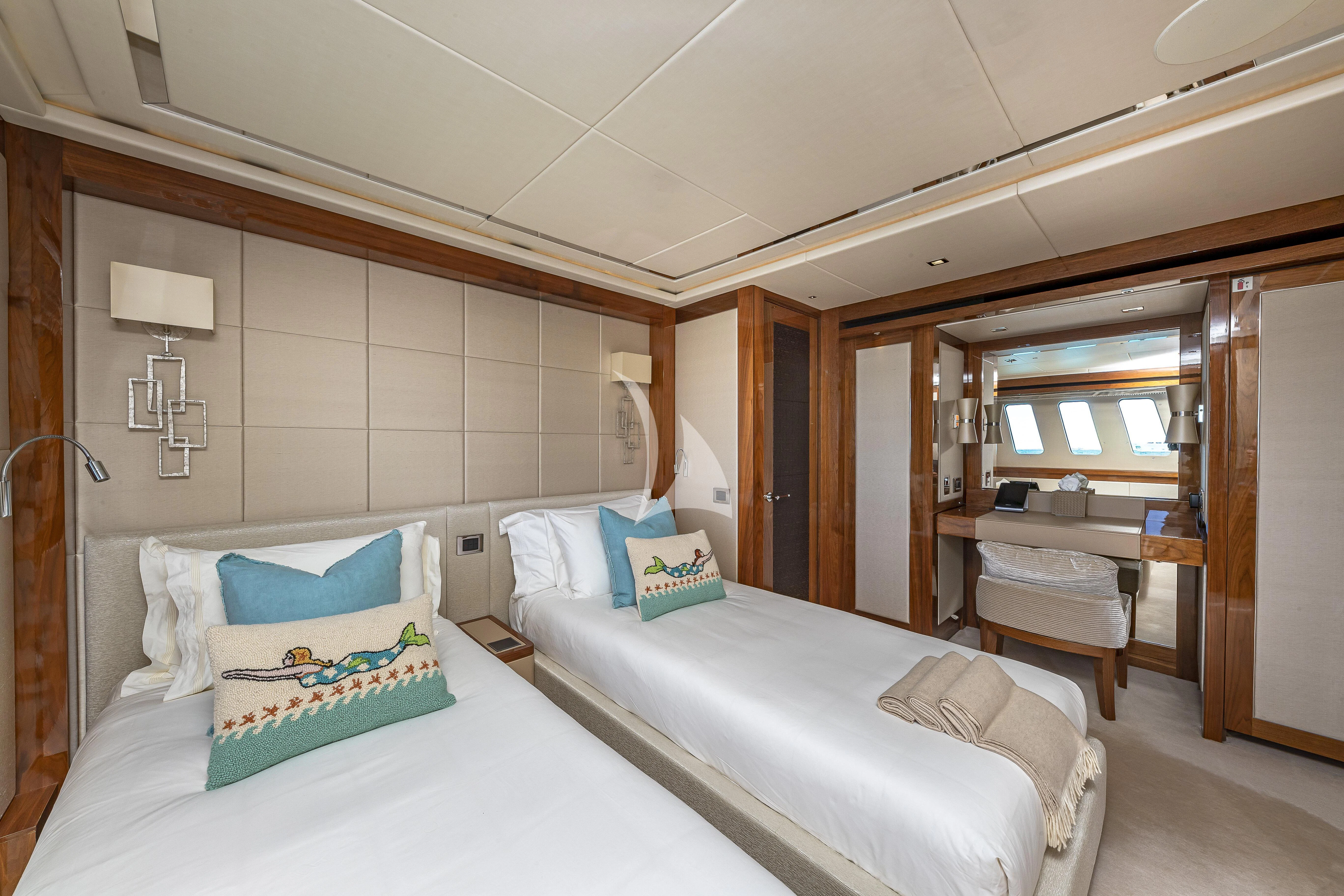 a room with two beds aboard ALESSANDRA III Yacht for Charter