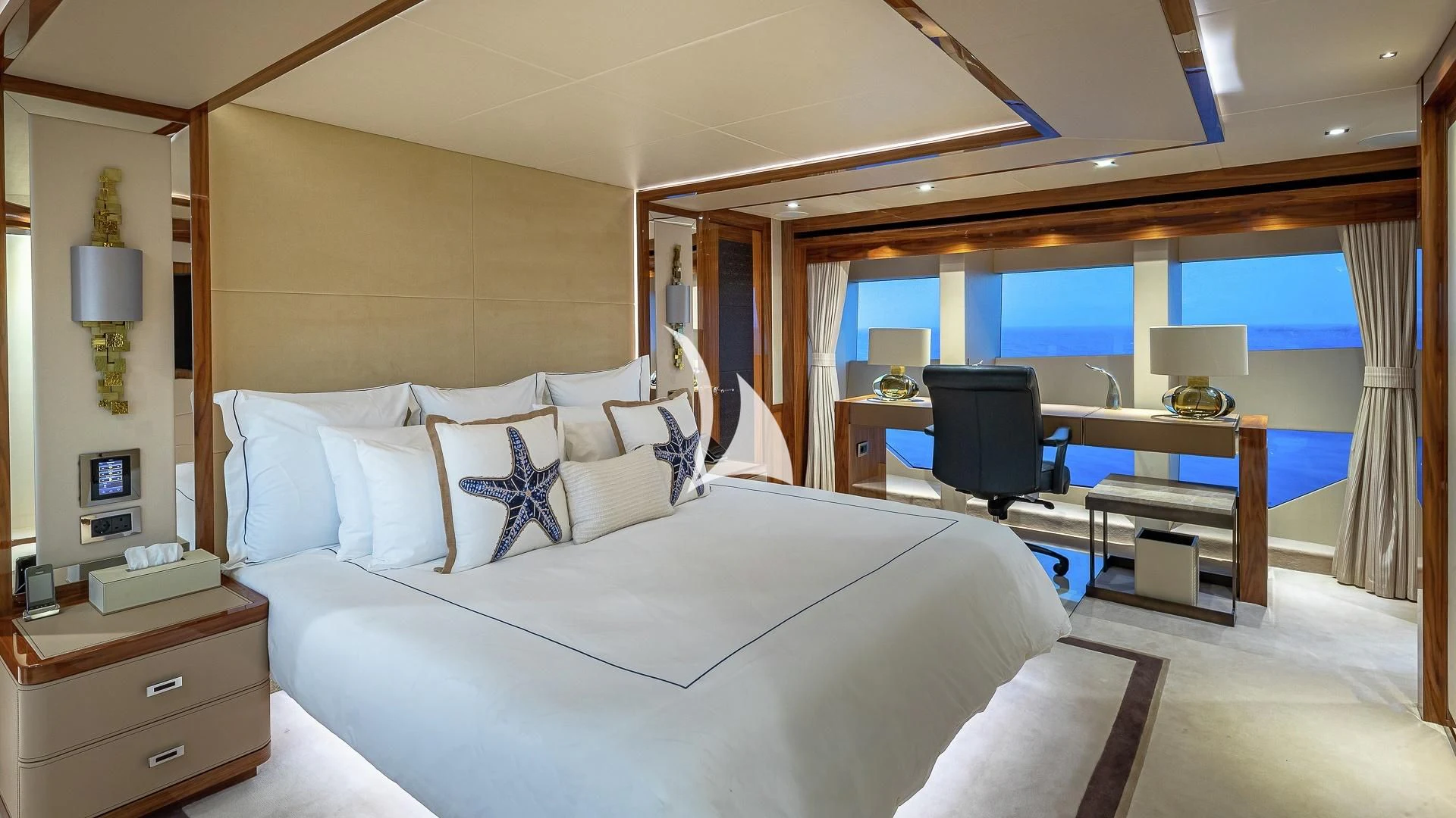 a hotel room with a bed and desk aboard ALESSANDRA III Yacht for Charter
