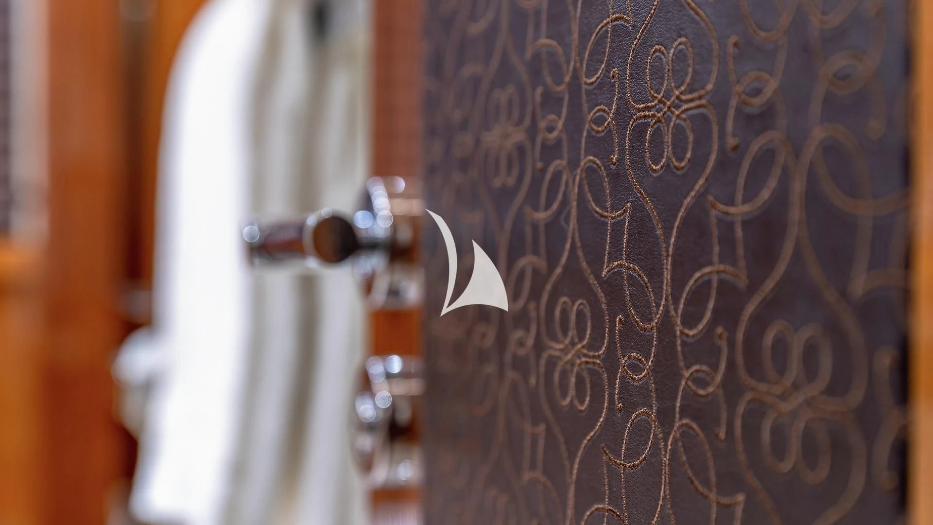 a door with a lock aboard ALESSANDRA III Yacht for Charter