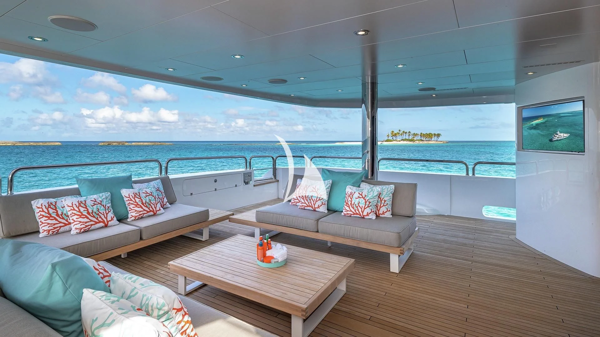 a living room with a large ocean aboard ALESSANDRA III Yacht for Charter