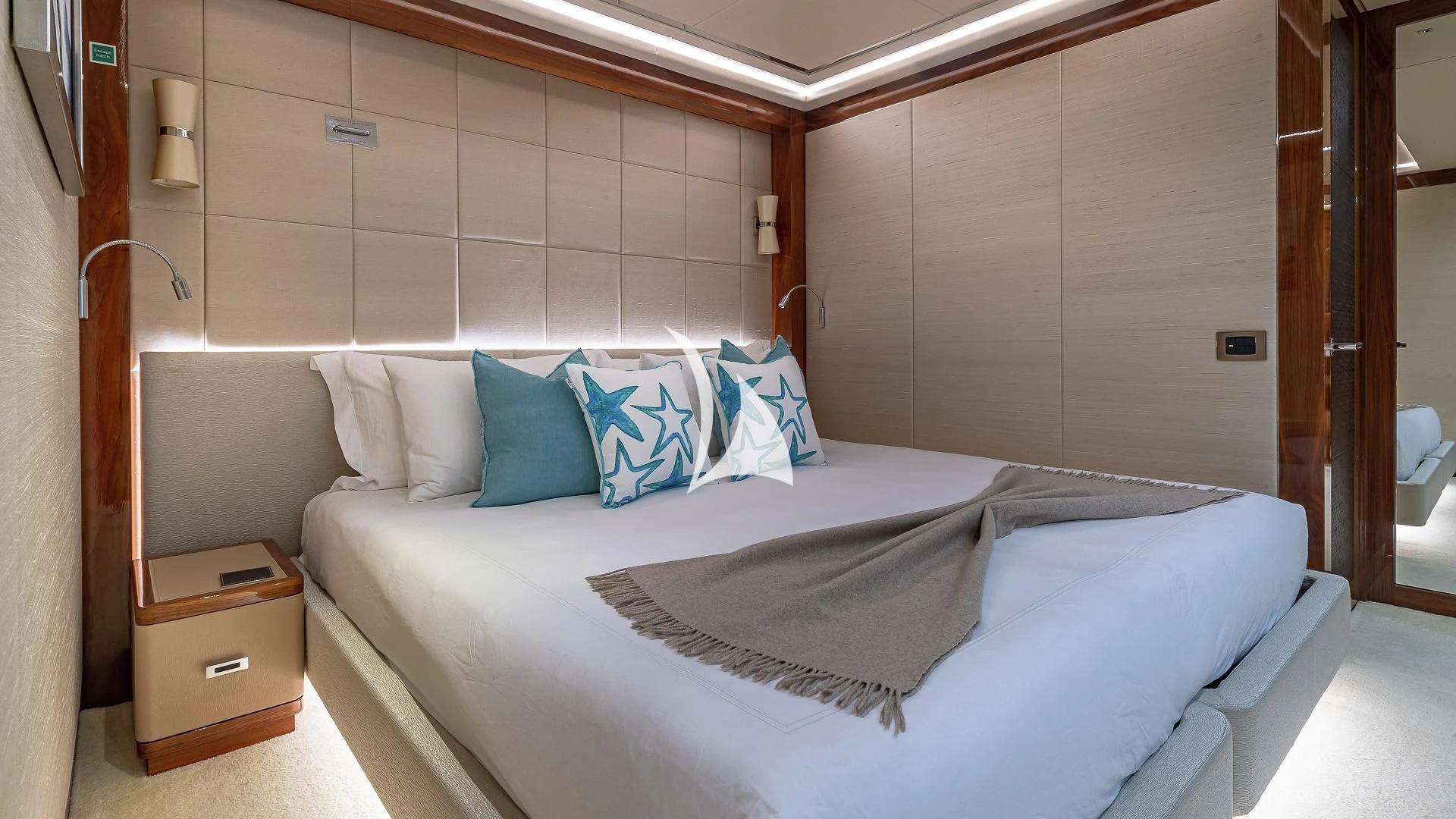 a bed in a room aboard ALESSANDRA III Yacht for Charter