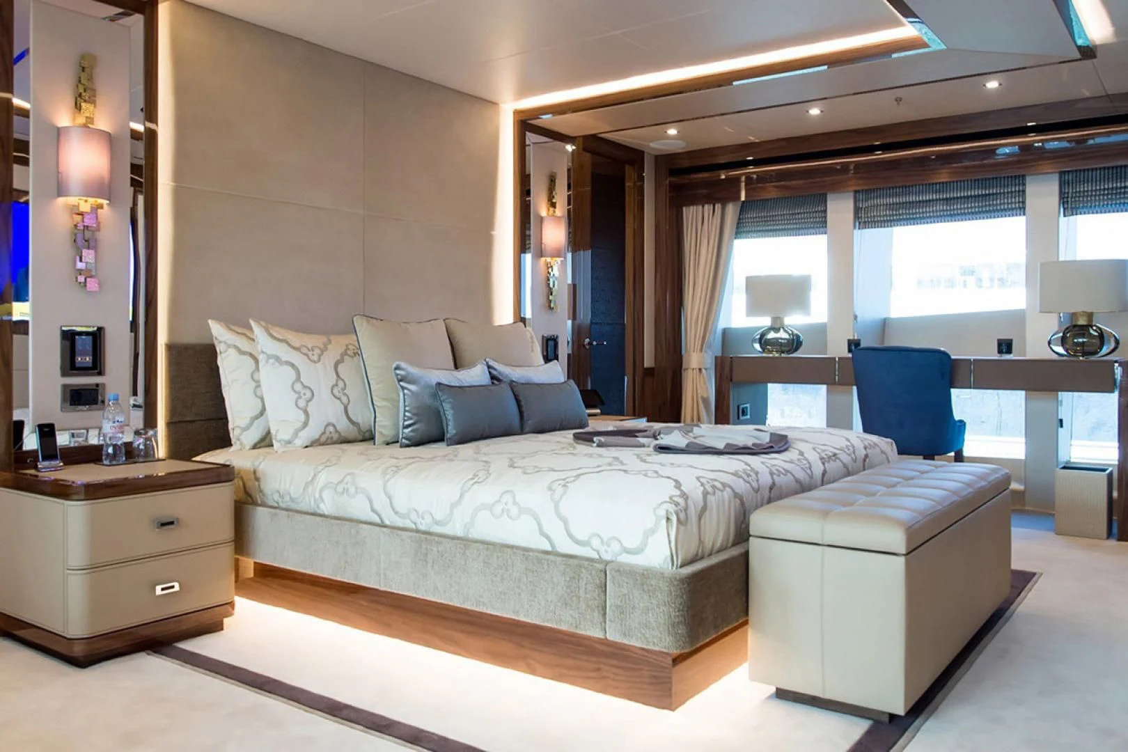 a large bed in a room aboard ALESSANDRA III Yacht for Charter
