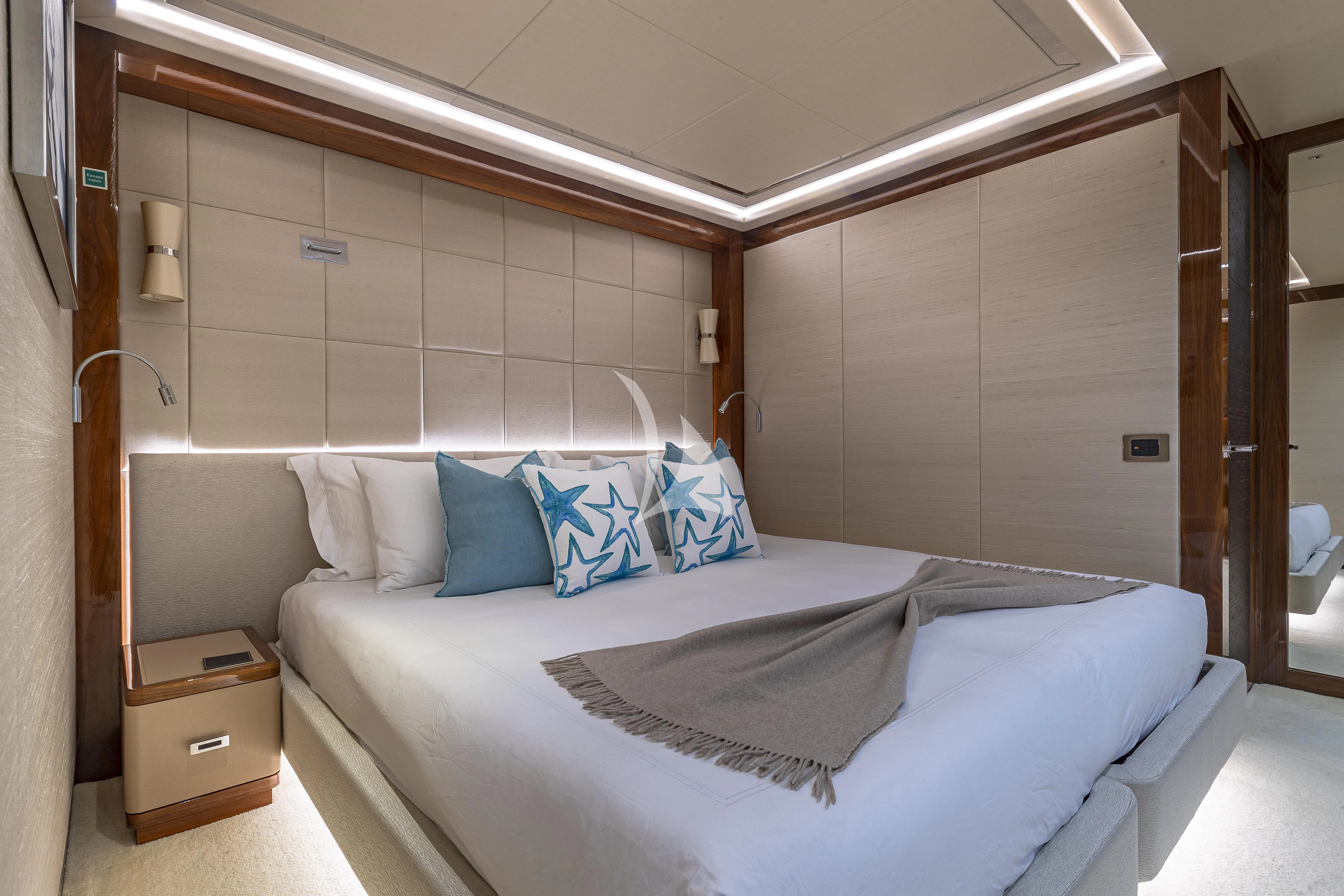 a bed in a room aboard ALESSANDRA III Yacht for Charter