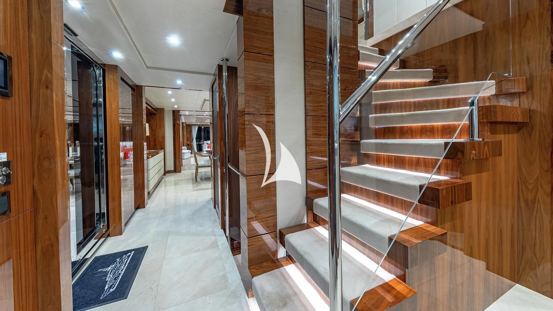 a room with a set of stairs aboard ALESSANDRA III Yacht for Charter
