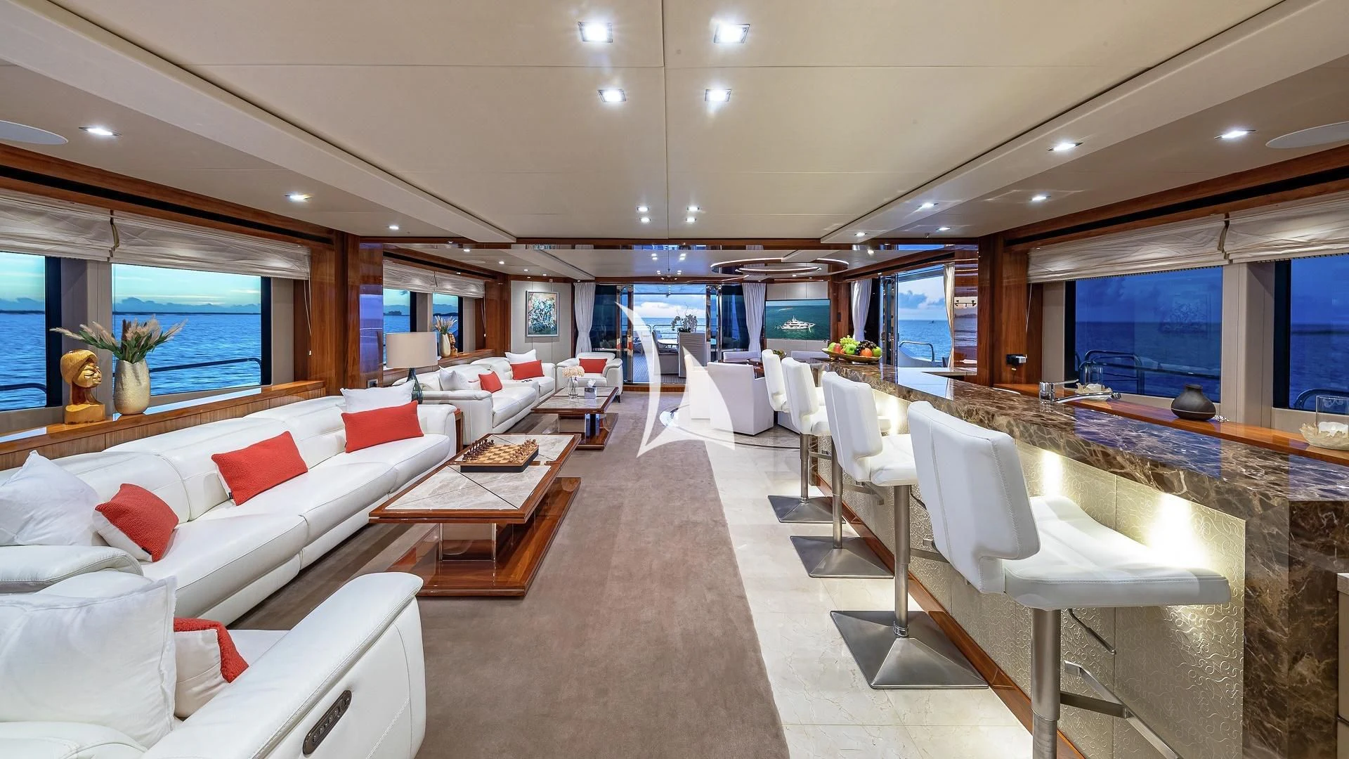 a large living room with a large open floor plan aboard ALESSANDRA III Yacht for Charter