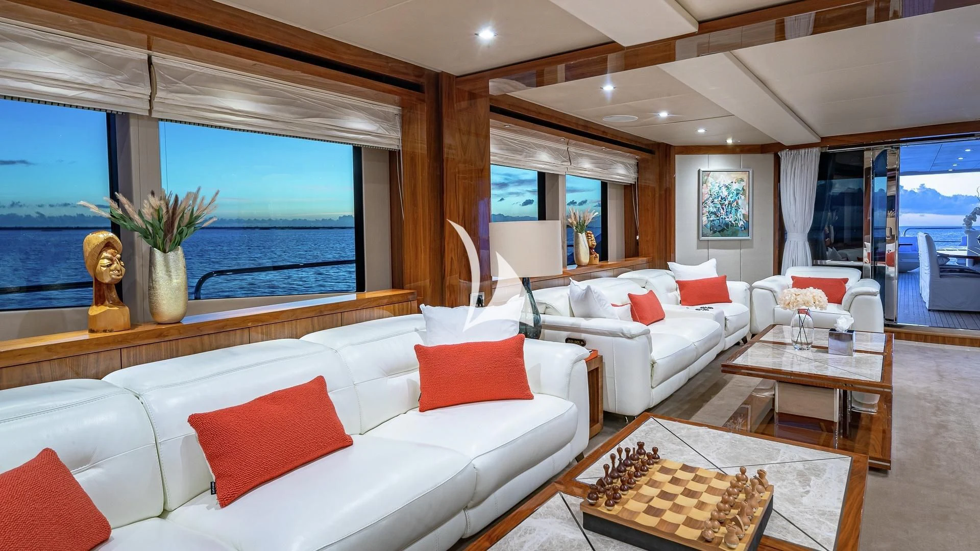 a living room with a large window aboard ALESSANDRA III Yacht for Charter